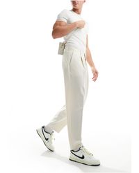 ASOS - Pantaloni eleganti oversize affusolati color pietra chiaro - Lyst