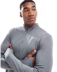 Nike - Pacer dri-fit - top manches longues à demi-fermeture éclair - Lyst
