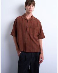 TOPMAN - Polo boutonné oversize à rayures en tissu texturé - Lyst