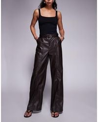River Island - Faux Leather Belted Wide Leg Trouser - Lyst