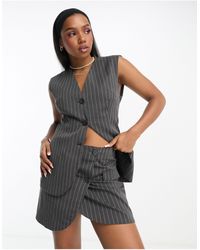 Monki - Mix & Match Asymmetric Wrap Mini Skirt - Lyst