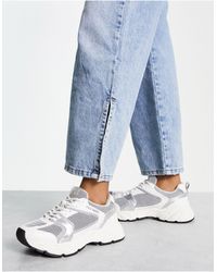 Steve Madden - Standout - chunky sneakers bianche e argento con pannelli multipli - Lyst