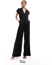 Vero Moda - Tuta jumpsuit nera accollata a maniche corte - Lyst