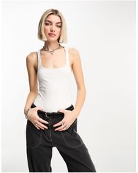 Collusion - Ribbed Tank Top Bodysuit - Lyst