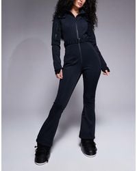 ASOS - Hourglass Ski Belted Ski Suit With Slim Kick Leg And Faux Fur Hood - Lyst