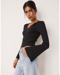 ASOS - Rib V Neck Top With Lace Trim And Flared Sleeve - Lyst