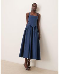ASOS - Robe mi-longue avec jupe évasée et corset structuré - jean foncé - Lyst