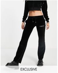 Reclaimed (vintage) Inspired Velour jogger With Diamante Print - Black