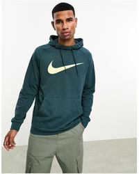 Nike - Sudadera verde oscuro intenso con capucha y logo swoosh dri-fit - Lyst