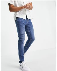 TOPMAN – eng geschnittene jeans mit stretch - Blau