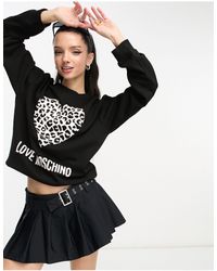 Love Moschino - Sweat avec logo et cœur à motif léopard - noir - Lyst