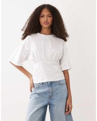 ASOS - Lace Up Back Cinch Waist T Shirt - Lyst