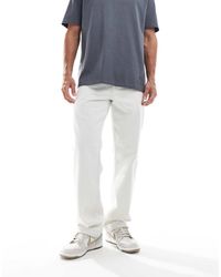 River Island - Vaqueros De Corte Suelto Con Lavado Azul Descolorido De - Lyst