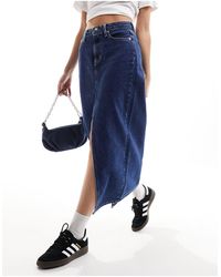 Calvin Klein - Jupe longue en jean fendue sur le devant - délavage foncé - Lyst