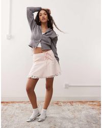 Miss Selfridge - Flippy Mini Skirt With Bows - Lyst