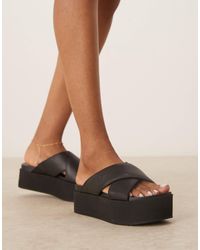 Calvin Klein - Cross Strap Flatform Sandals - Lyst