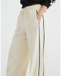 River Island - Wide Leg Side Striped Joggers - Lyst