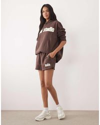Kaiia - Studio Cotton Rich Embroidered Logo Sweat Shorts Co-ord - Lyst