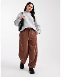 ASOS - Curve - pantalon bouffant à enfiler en velours côtelé - chocolat - Lyst