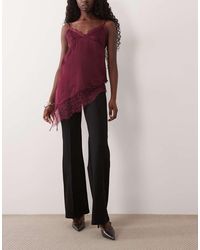 Mango - Geplooide Flared Broek - Lyst