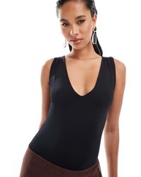 River Island - V-Neck Bodysuit - Lyst