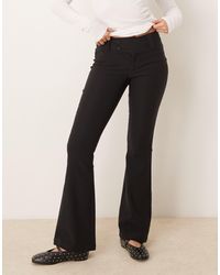 Gina Tricot - Low Rise Flare Leg Pants With Double Button Waistband - Lyst
