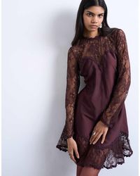 TOPSHOP - Lace Sleeve Flippy Hem Mini Dress - Lyst