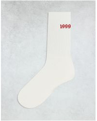 ASOS - Calzini sportivi bianchi con ricamo "1999" - Lyst