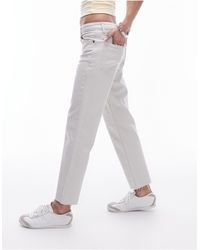 TOPSHOP - Jeans dritti a vita medio alta taglio corto sporco con bordi grezzi - Lyst