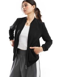 Vero Moda - Bomber léger zippé devant - Lyst