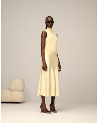 ARRANGE - Robe mi-longue taille basse en maille avec jupe en satin - babeurre - Lyst