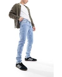 Calvin Klein - – schmale karottenjeans - Lyst