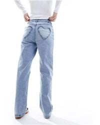 Miss Selfridge - Jeans dritti lavaggio medio con tasca a forma di cuore - Lyst
