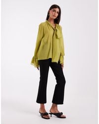 Vero Moda - Sculpting Stretch High Waist Pleat Front Flare Trouser - Lyst