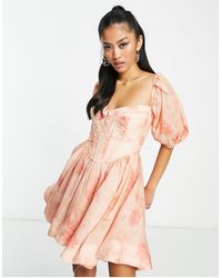 Bardot - Robe courte corsetée à manches bouffantes - abricot à fleurs - Lyst
