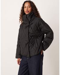 Vila - High Neck Quilted Jacket With Tie Details - Lyst