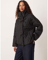 Vila - High Neck Quilted Jacket With Tie Details - Lyst
