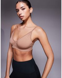4505 - Icon Seamless Intimate Light Support Sports Bra With Adjustable Straps - Lyst