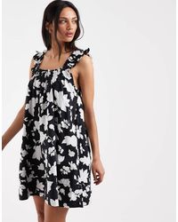 Levi's - Meg Babydoll Mini Dress With Floral Print - Lyst