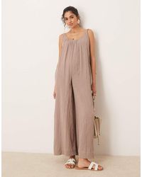 ASOS - Mono Largo Color Topo Con Cuello Ancho Y Detalle De Lazadas Trenzadas De Tejido Doble De -Neutro - Lyst