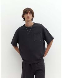 Pull&Bear - Oversized T-Shirt Met Zak Met Studs - Lyst