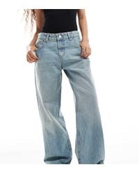ASOS - Asos Design Petite Low Rise baggy Jeans - Lyst