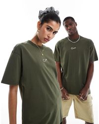 Nike - T-shirt oversize avec logo virgule au centre - vert foncé - Lyst