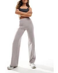 Tala - Dayflex High Waisted Wide Leg Flared Yoga Pant - Lyst