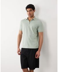 SELECTED - Polo à col zippé - clair - Lyst