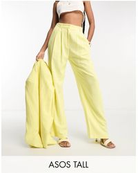 ASOS - Asos design tall - pantaloni da abito a fondo ampio limone con pieghe invertite - Lyst