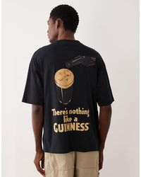 ASOS - Oversized T-Shirt With Guinness Print - Lyst