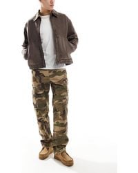 Superdry - – weite cargohose aus baumwolle mit us-military-muster - Lyst