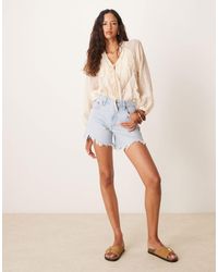 Abercrombie & Fitch - Short en jean déchiré coupe dad à taille haute - clair délavé - Lyst