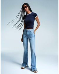 Bershka - Flared Jeans With Slit - Lyst